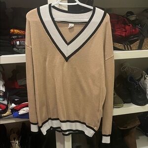 Woman’s  Tan V-Neck Sweater